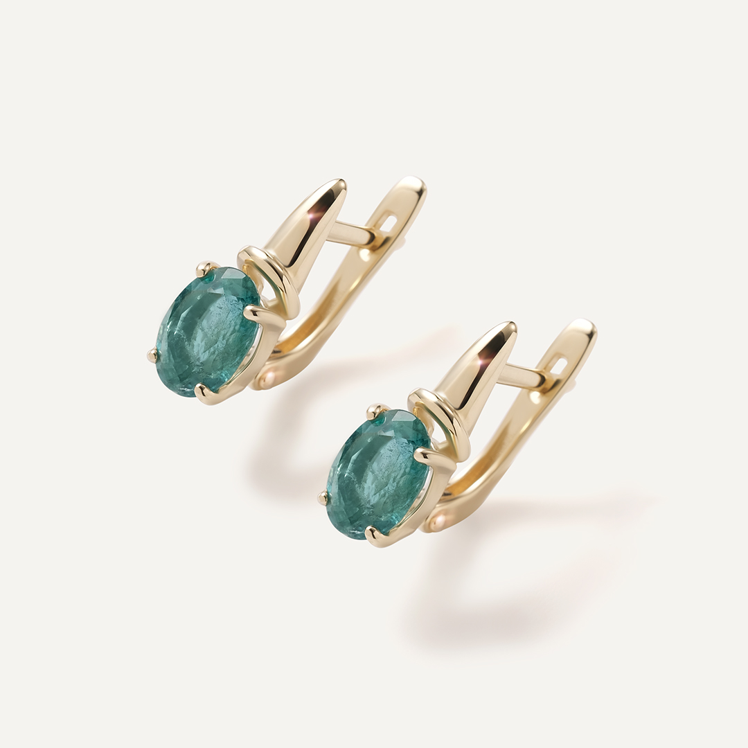 Серьги из желтого золота с изумрудами