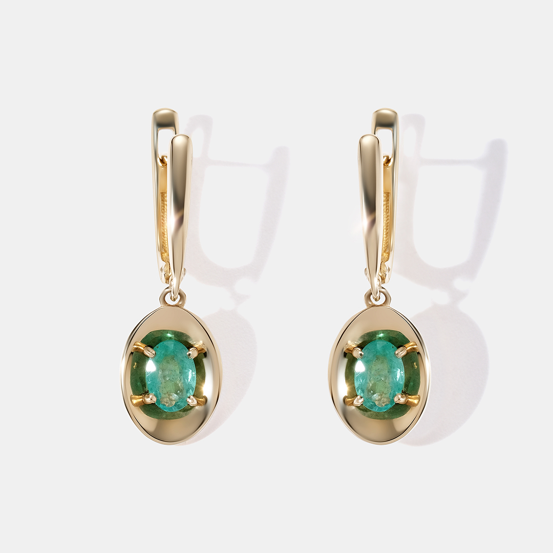 Серьги из желтого золота с изумрудами