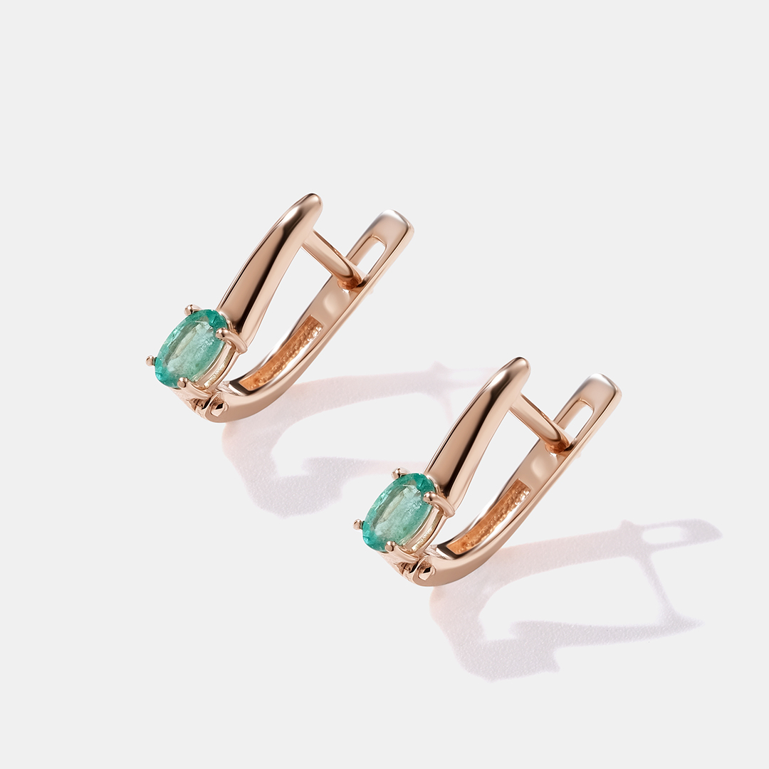 Серьги из золота с изумрудами