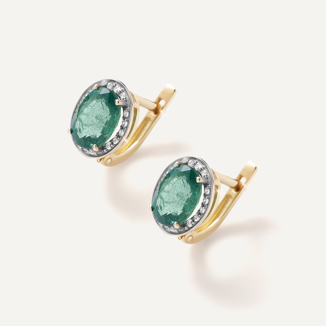 Серьги из желтого золота с изумрудами