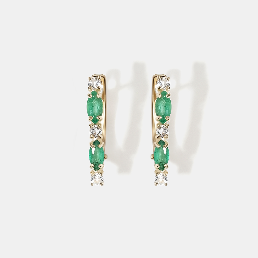 Серьги из желтого золота с изумрудами