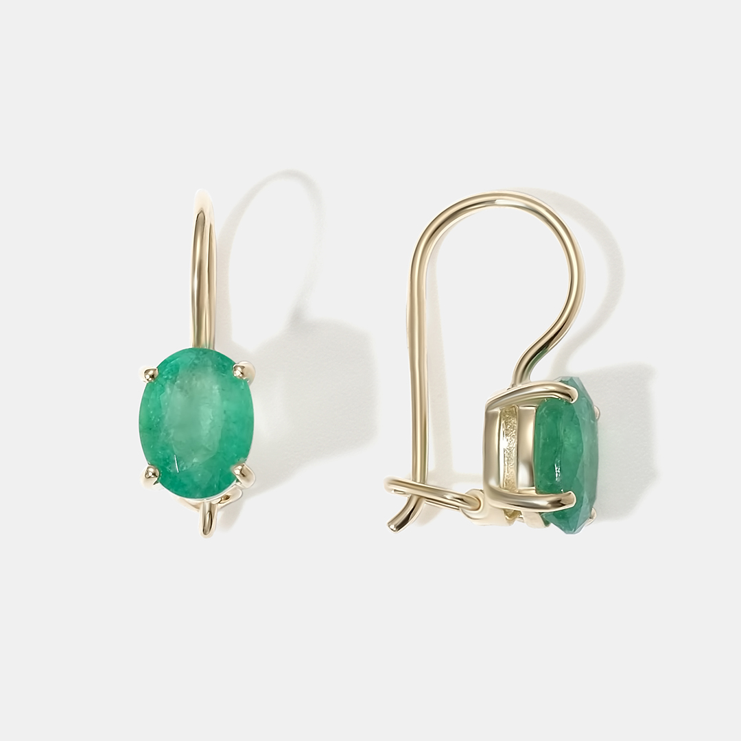 Серьги из желтого золота с изумрудами