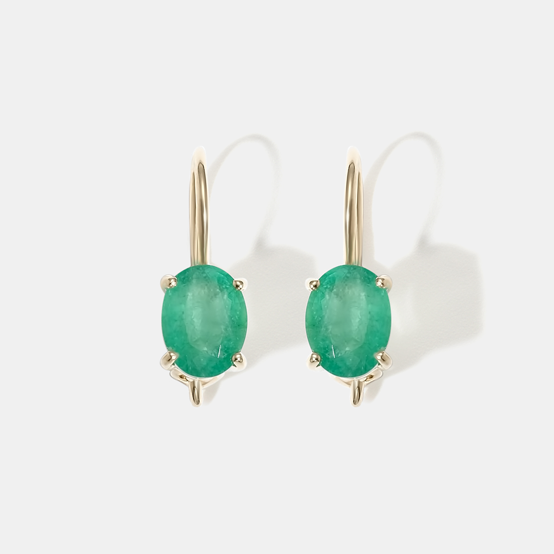 Серьги из желтого золота с изумрудами