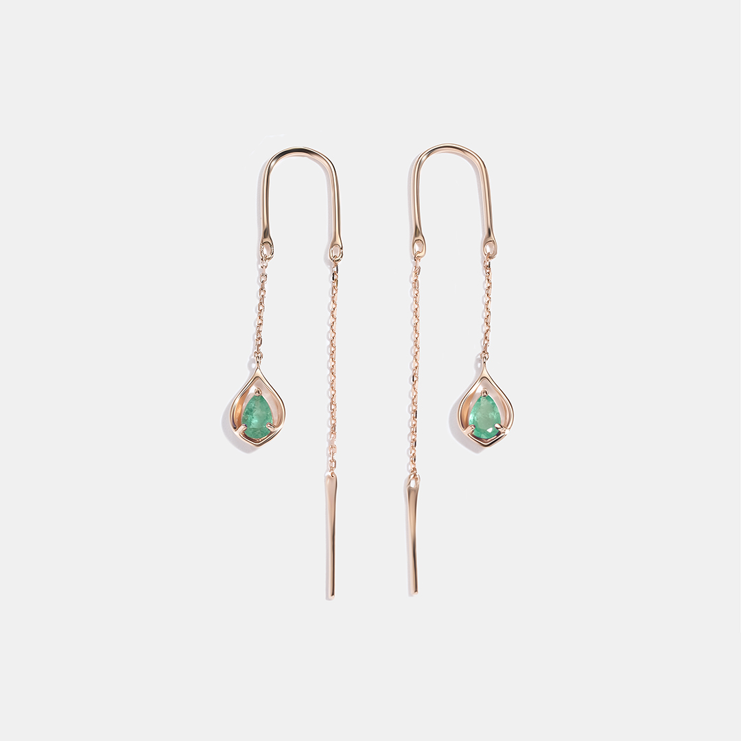 Серьги-протяжки из золота с изумрудами