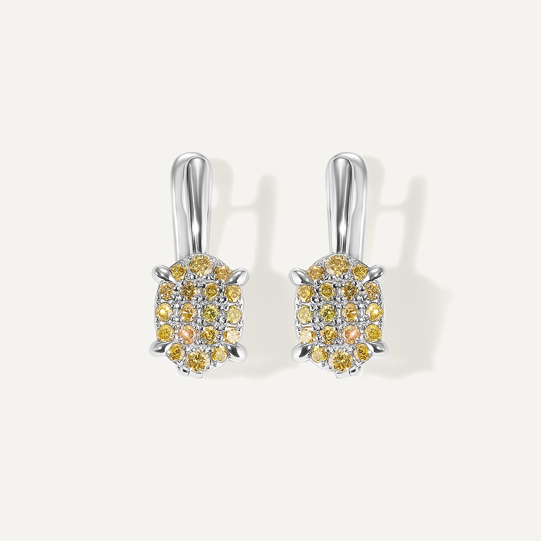 Серьги из белого золота с желтыми бриллиантами