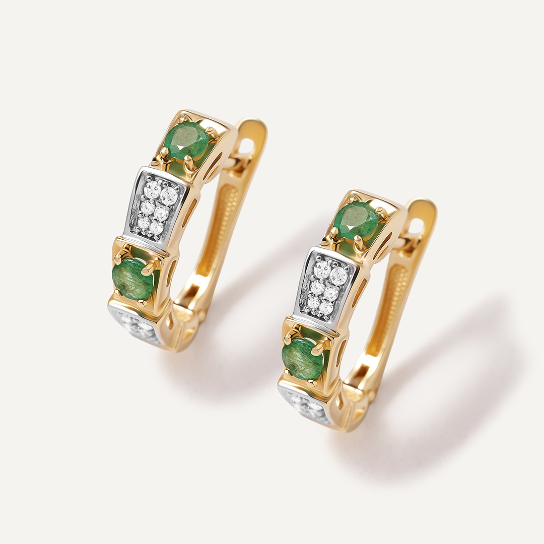 Серьги из желтого золота с изумрудами