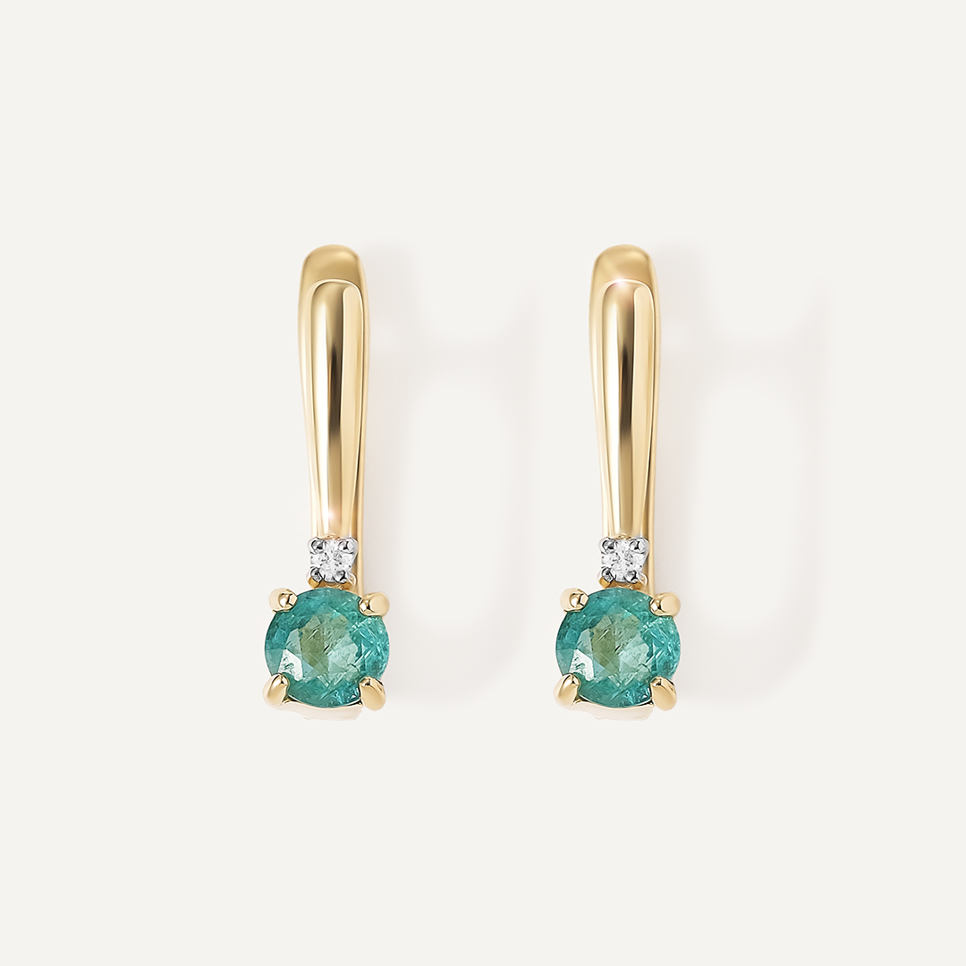 Серьги из желтого золота с изумрудами