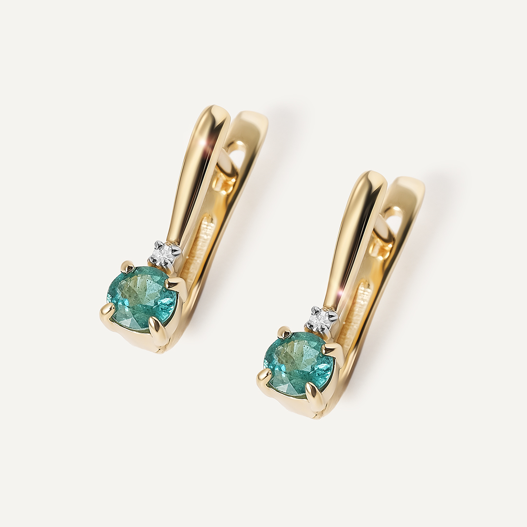 Серьги из желтого золота с изумрудами