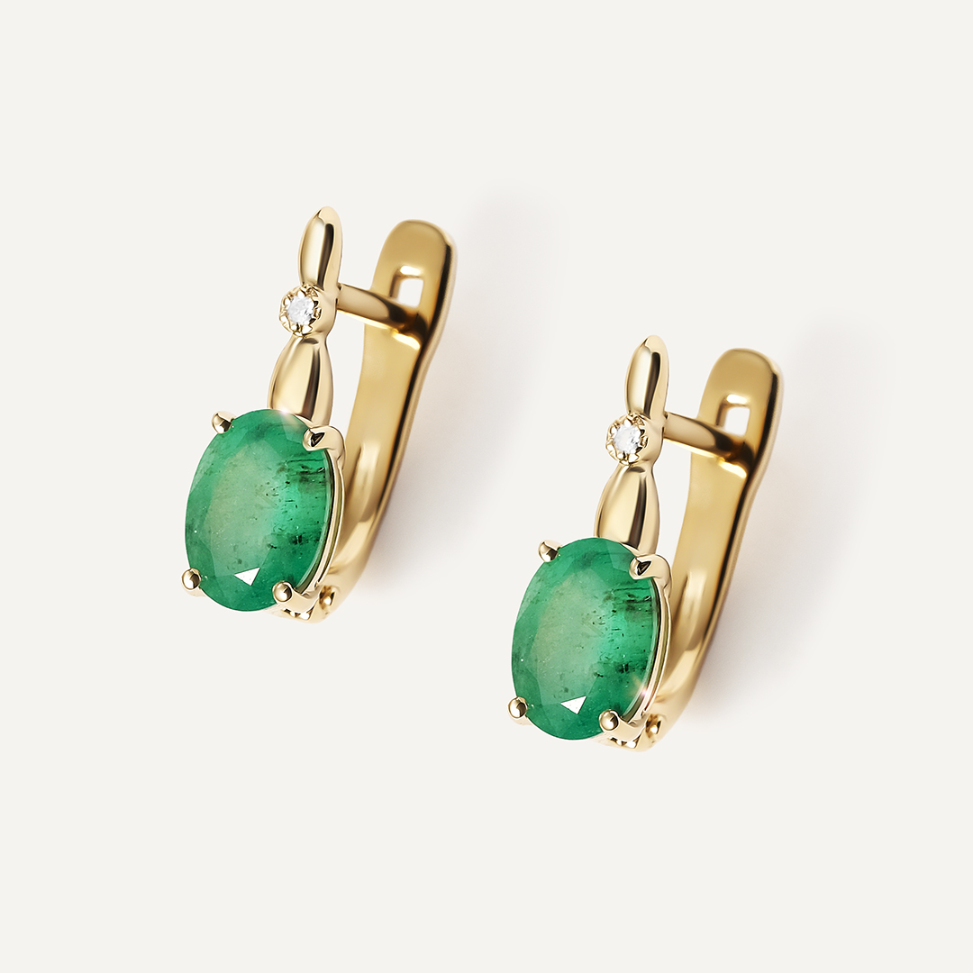 Серьги из желтого золота с изумрудами