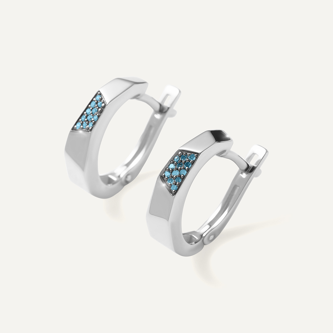 Серьги из белого золота с голубыми бриллиантами