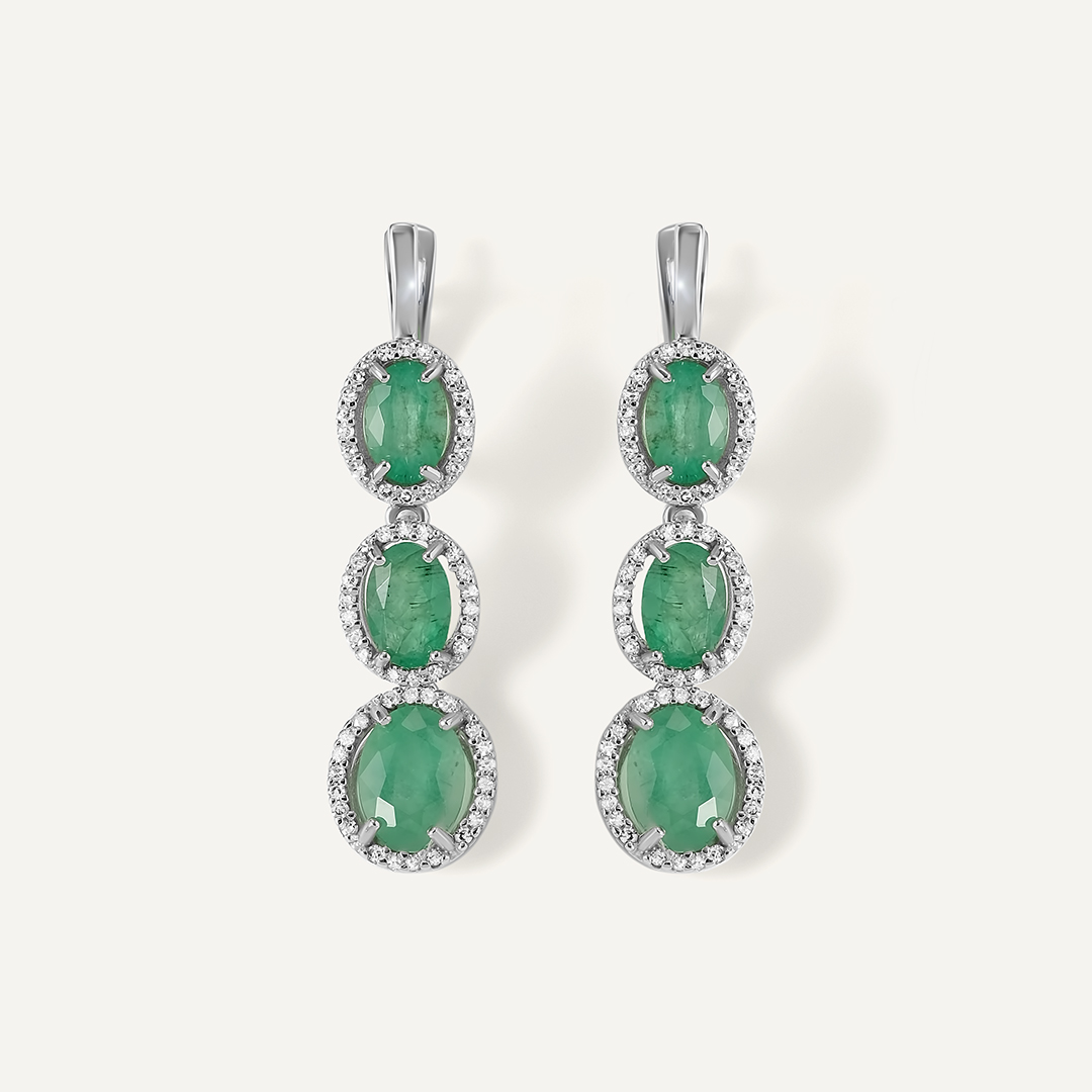 Серьги из белого золота с изумрудами