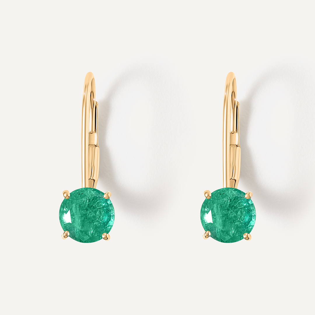 Серьги из желтого золота с изумрудами