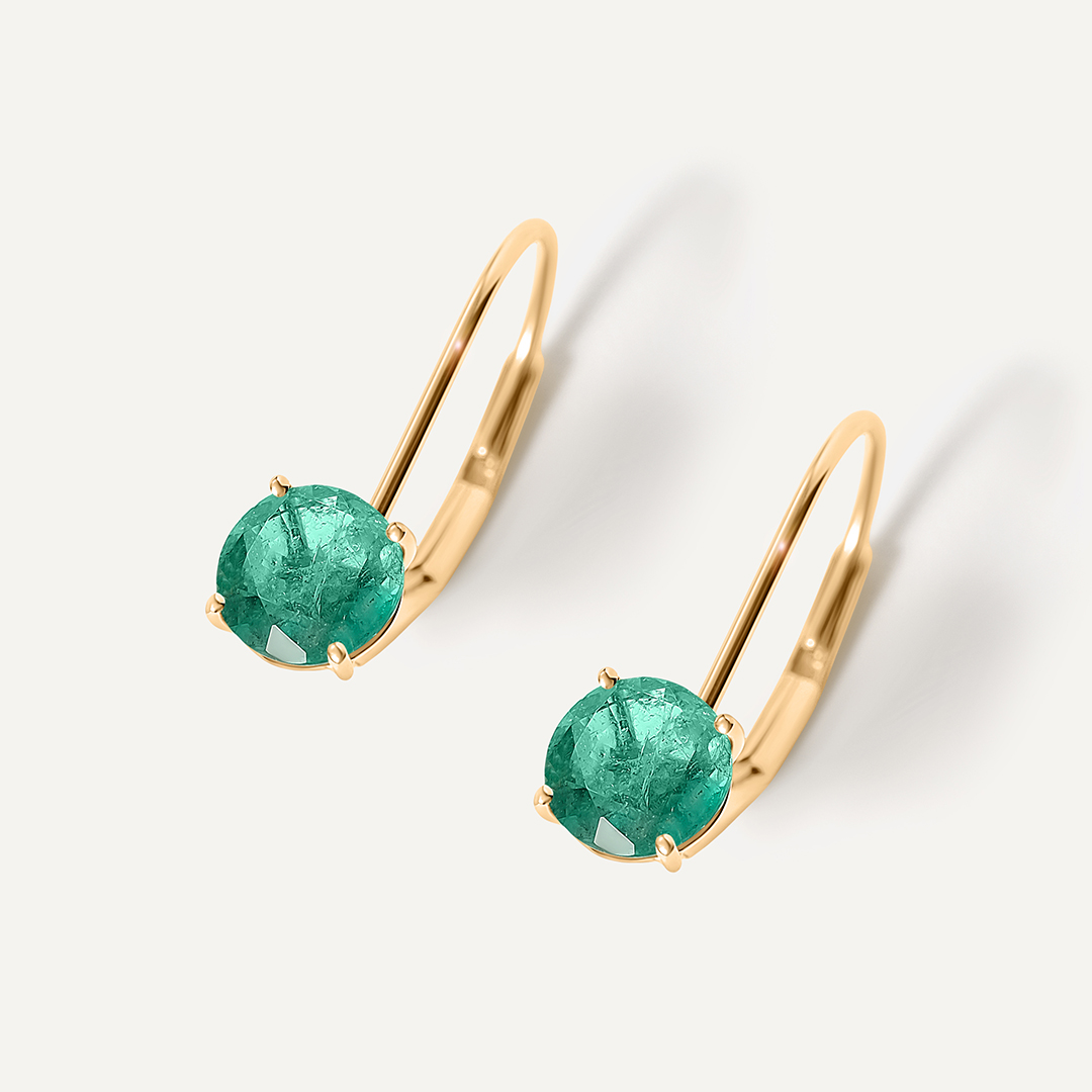 Серьги из желтого золота с изумрудами