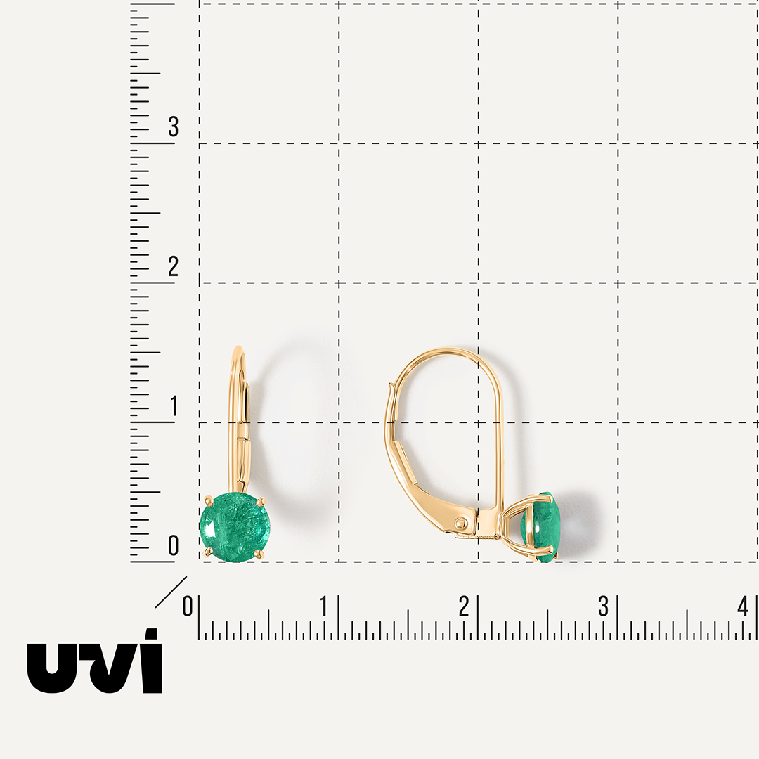 Серьги из желтого золота с изумрудами