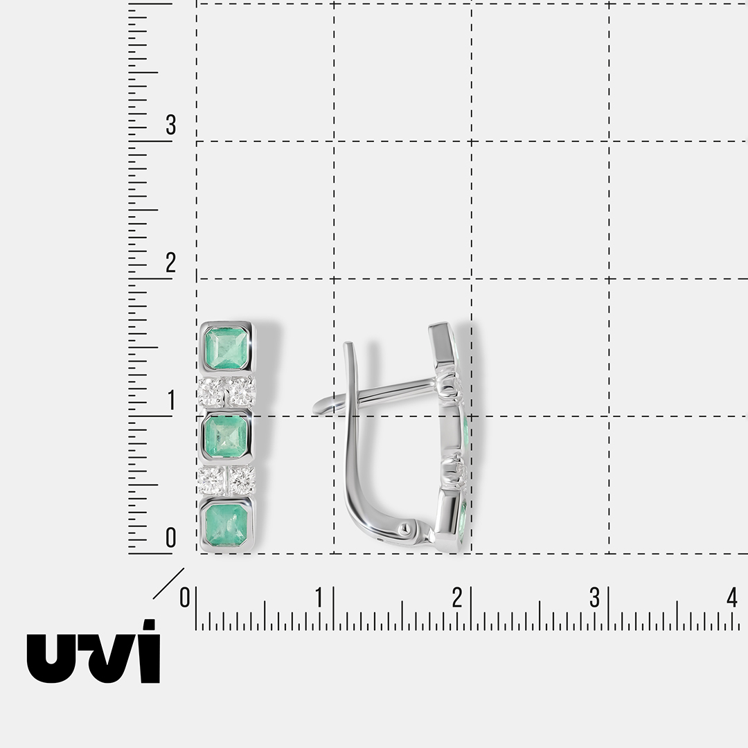 Серьги из белого золота с изумрудами