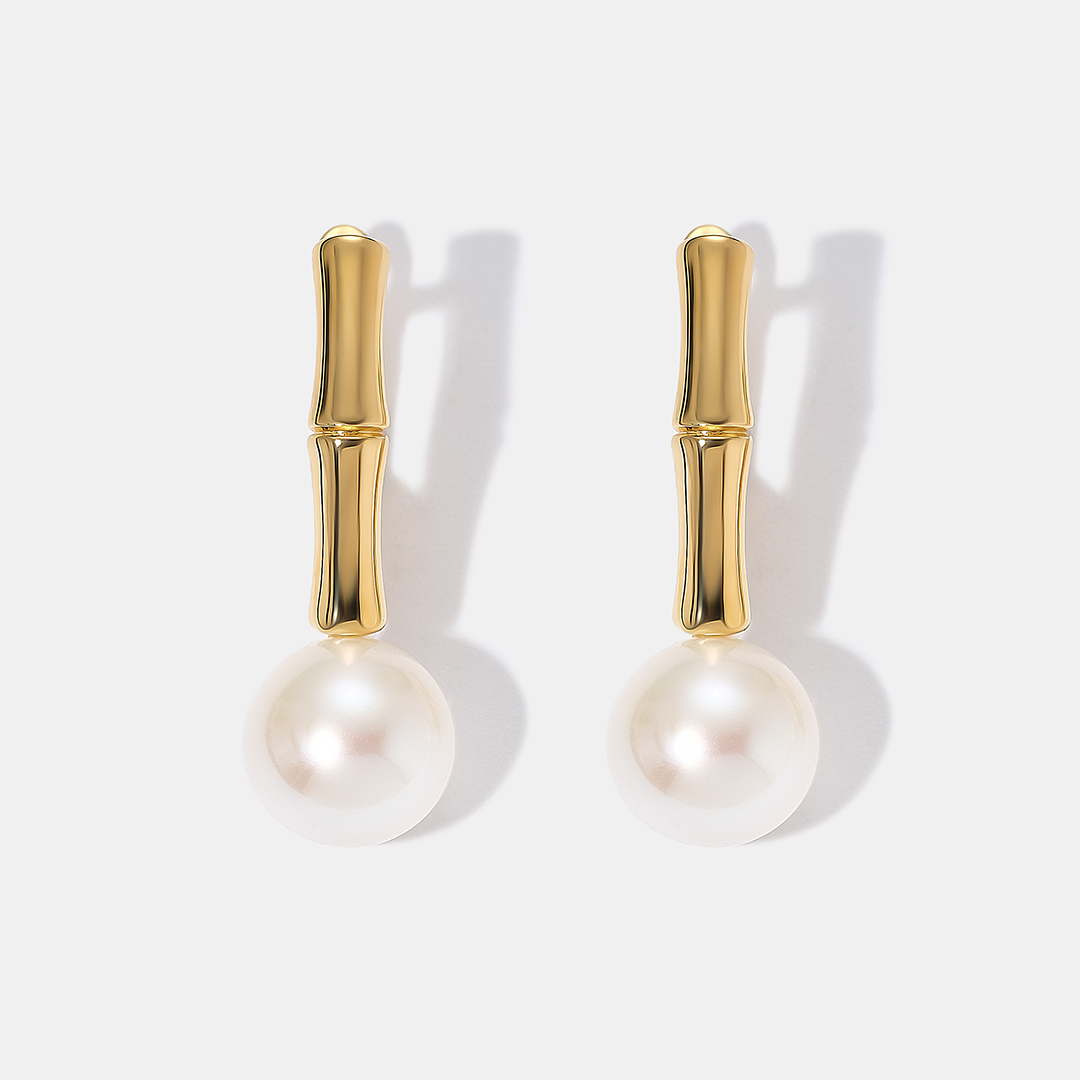 Серьги из желтого золота с жемчугом
