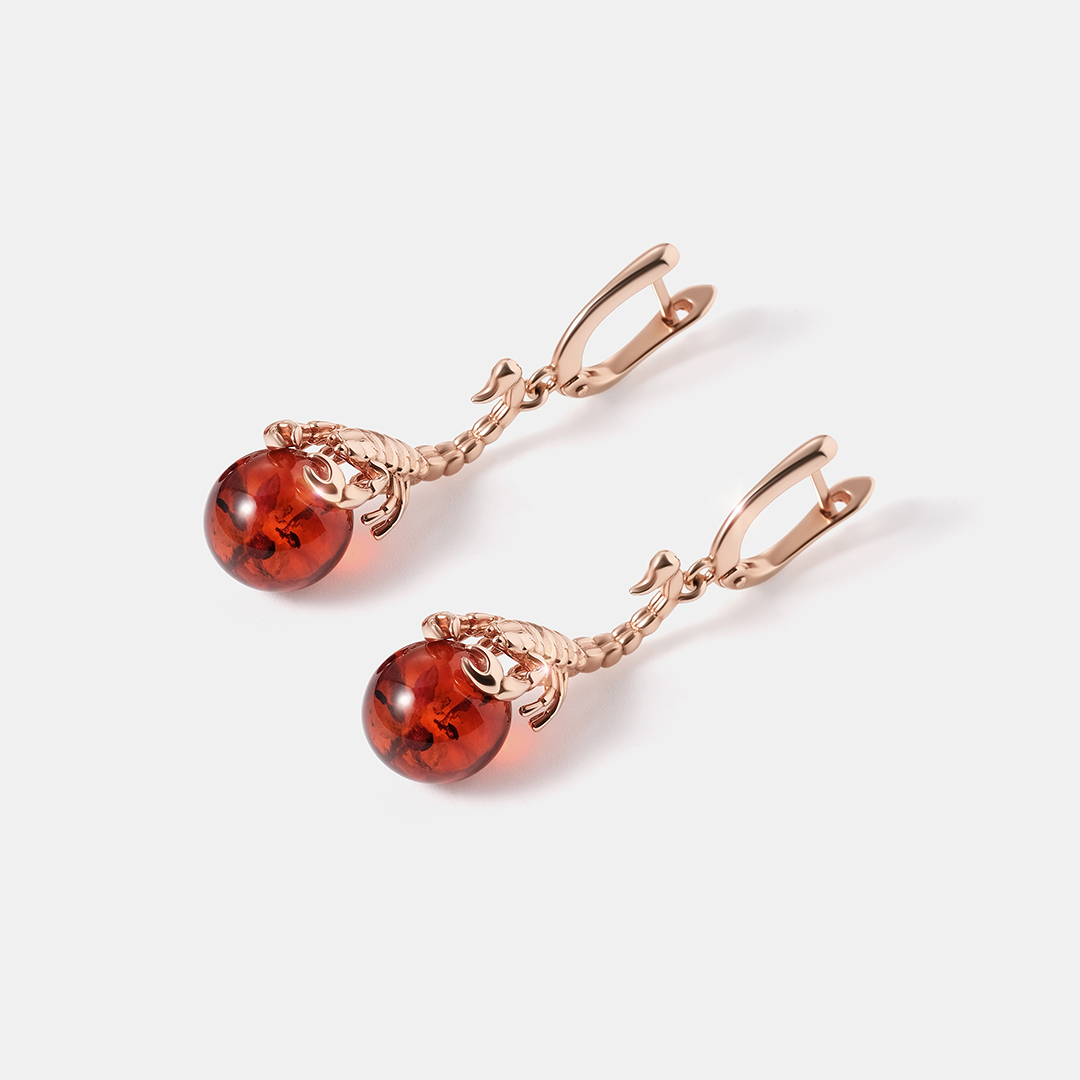 Серебряные серьги с янтарем "Скорпионы"