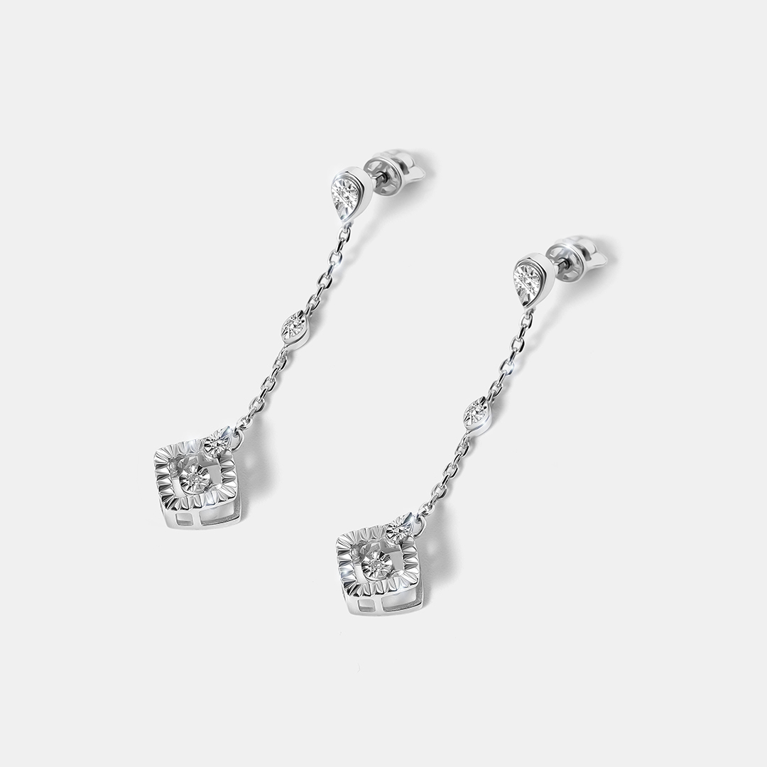 Серебряные серьги-пусеты с бриллиантами "Танцующий камень"