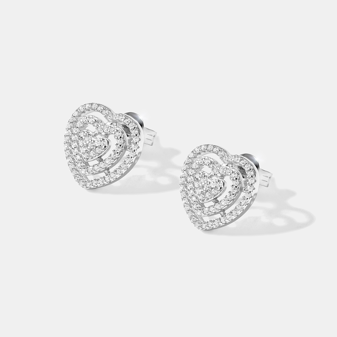 Серебряные серьги-пусеты с кубическим цирконием "Сердца"