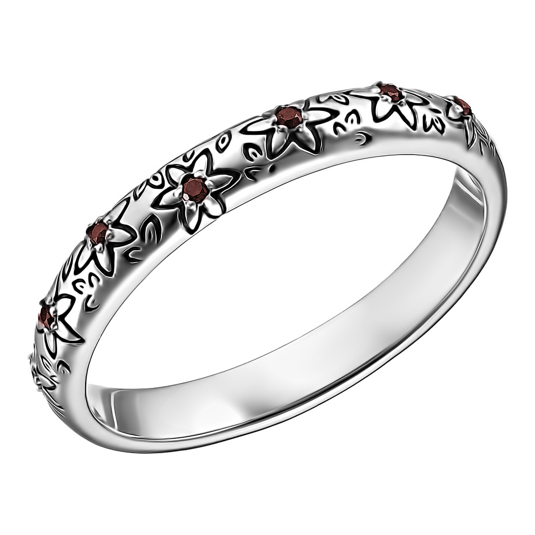 Серебряное кольцо 925 пробы; оксидирование; Благовещенье; вставки 7 Гранат;