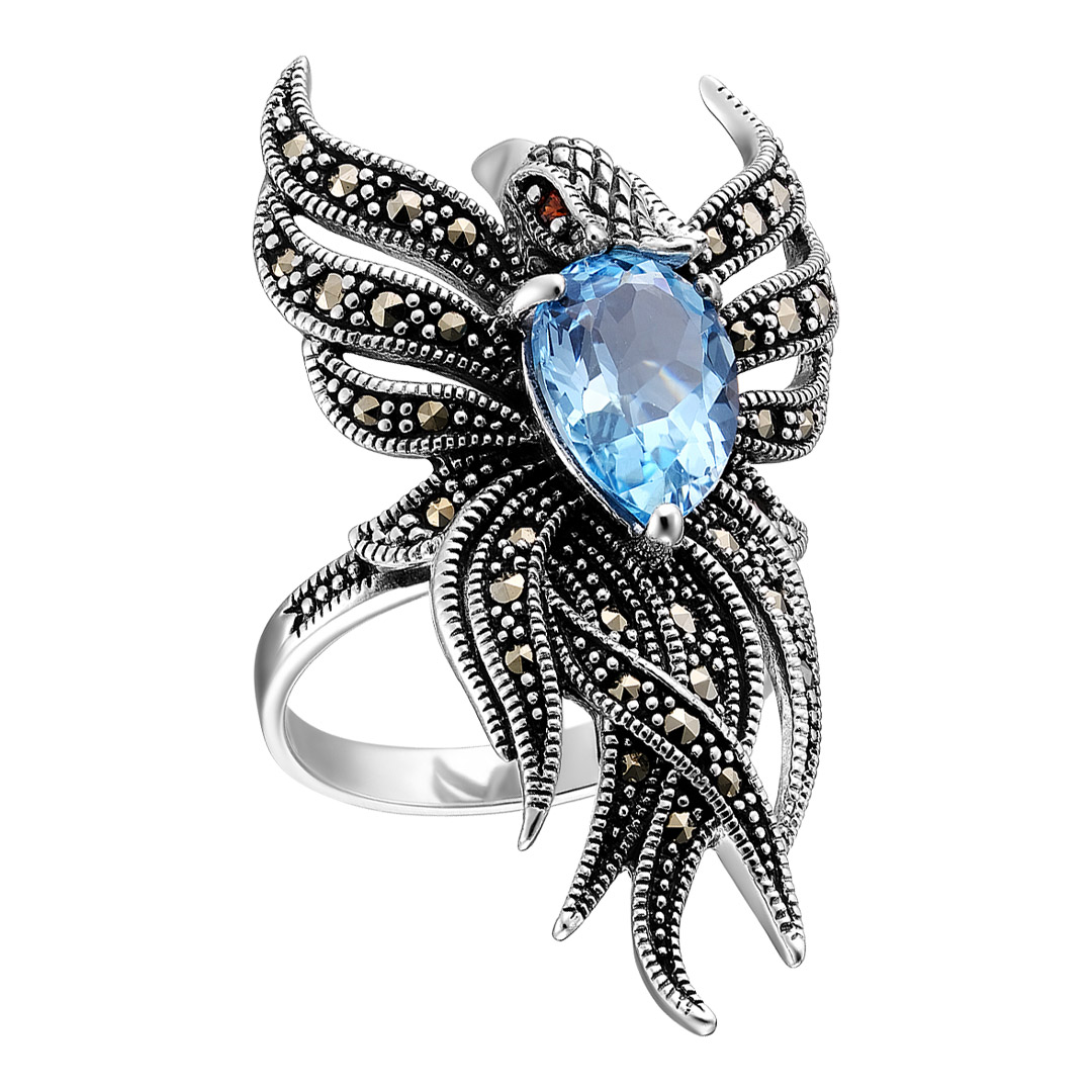 Серебряное кольцо 925 пробы; оксидирование; вставки 1 Гранат; 1 Топаз; 36 Марказит;