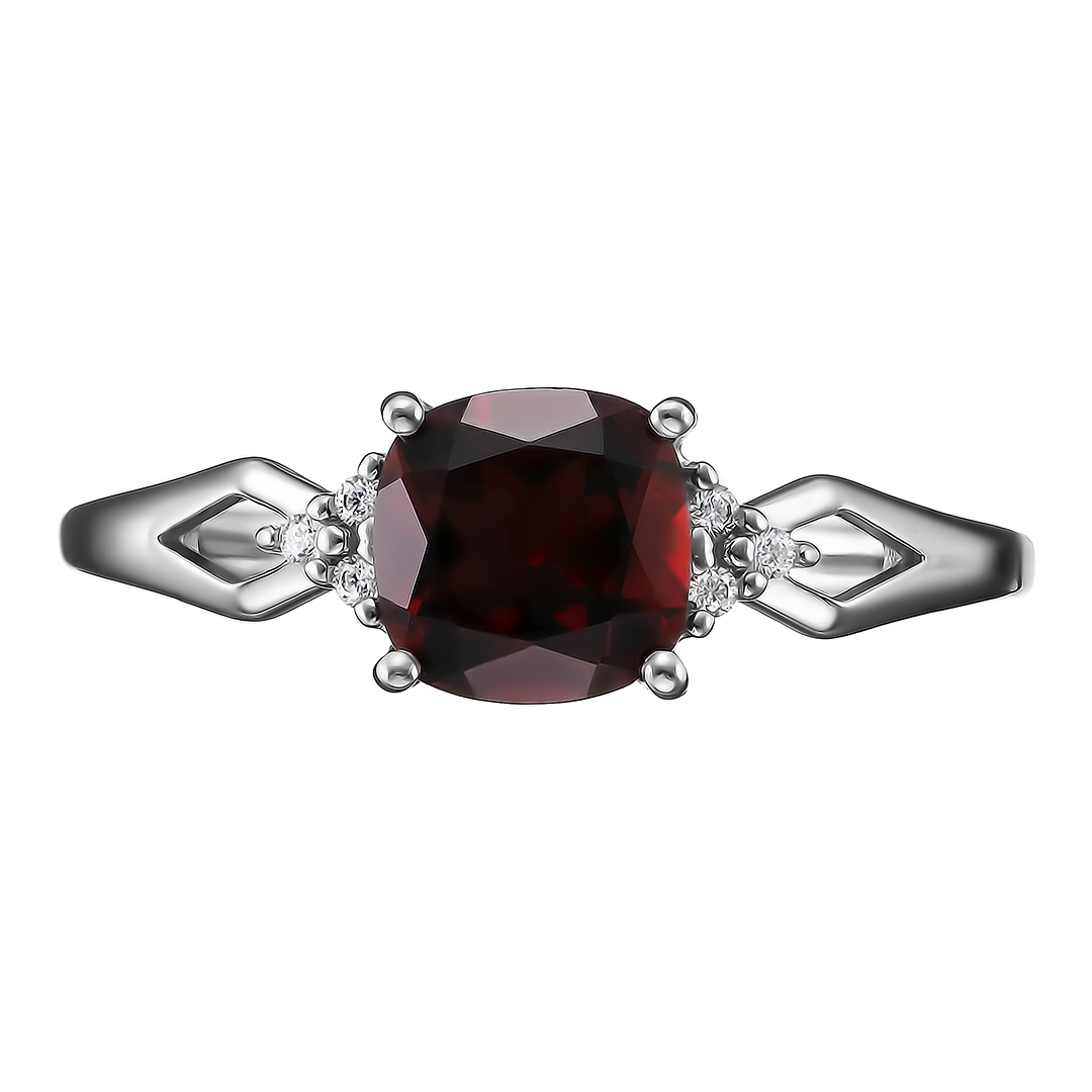 Серебряное кольцо 925 пробы; вставки 1 Гранат; 6 Фианит бесцв.;