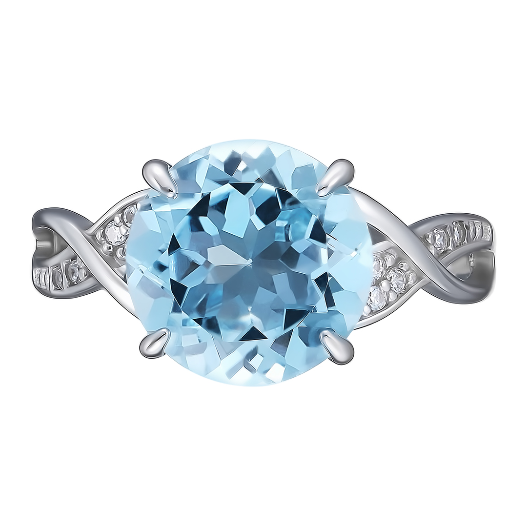 Серебряное кольцо 925 пробы; вставки 1 Топаз; 14 Фианит бесцв.;