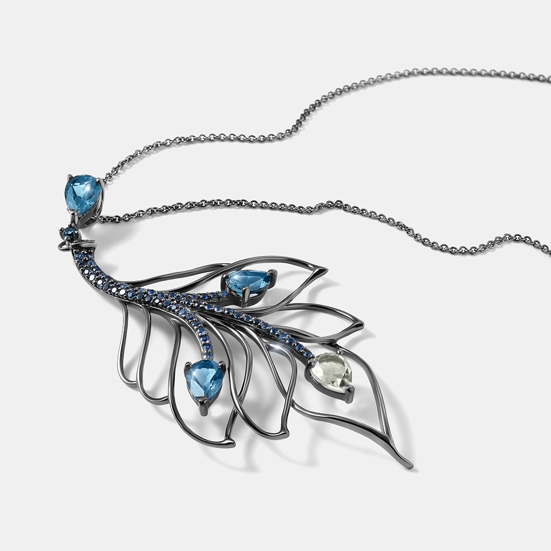 Колье из белого золота с празиолитом, топазами и сапфирами "Перо"