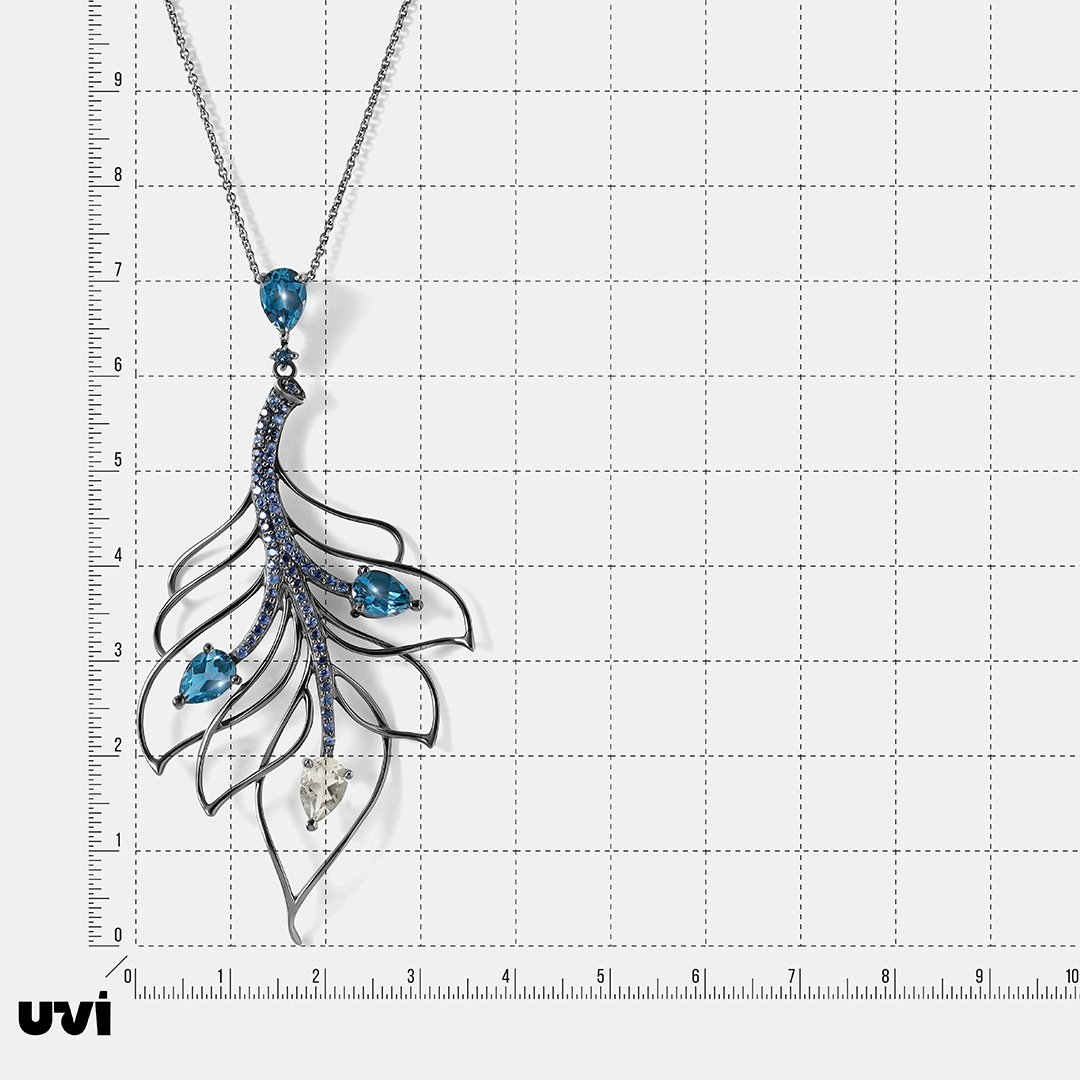 Колье из белого золота с празиолитом, топазами и сапфирами "Перо"
