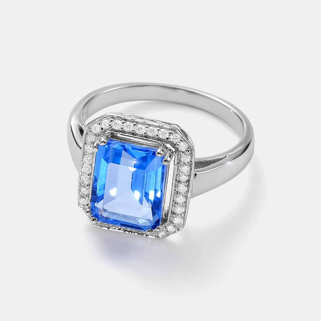 Серебряное кольцо 925 пробы; вставки 1 Топаз 3,8ct; 32 Куб.Цирконий бесцв. 0,32ct;