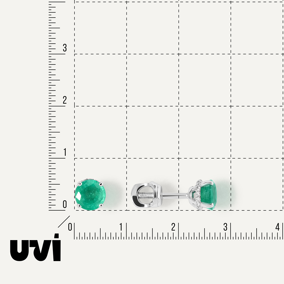 Серьги из белого золота с изумрудами