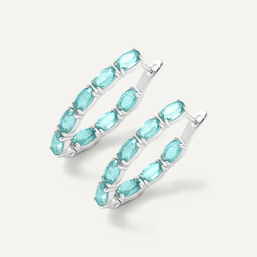 Серьги из белого золота с изумрудами