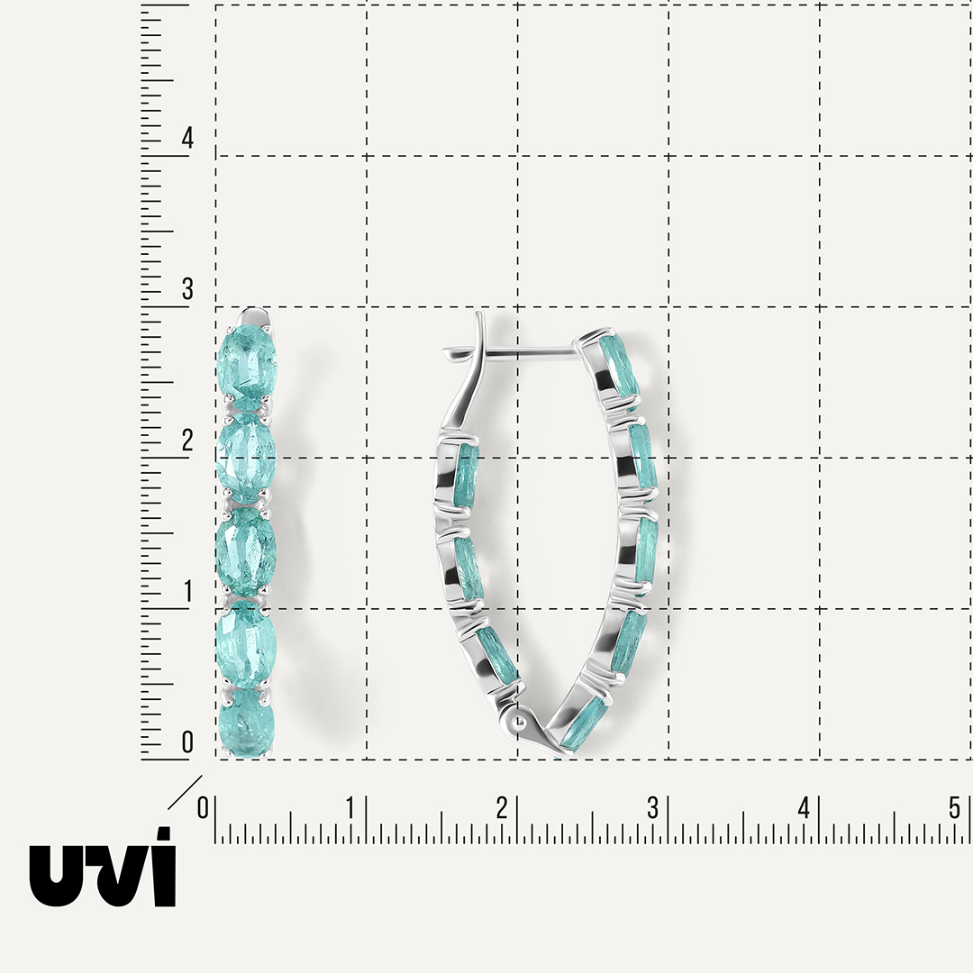 Серьги из белого золота с изумрудами