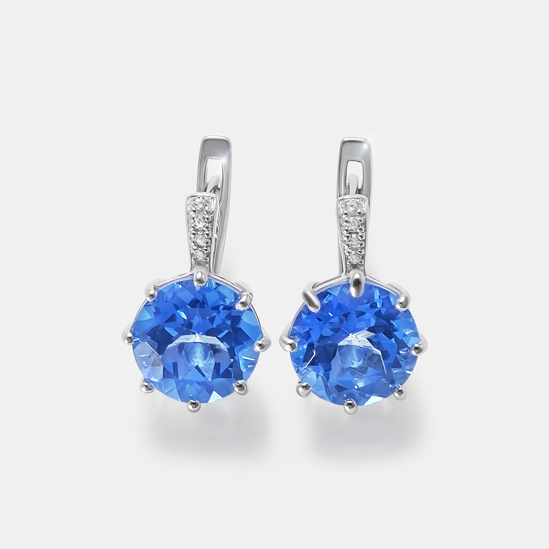 Серебряные серьги 925 пробы; вставки 2 Топаз 9ct; 8 Куб. Цирконий бесцв. 0,1ct;