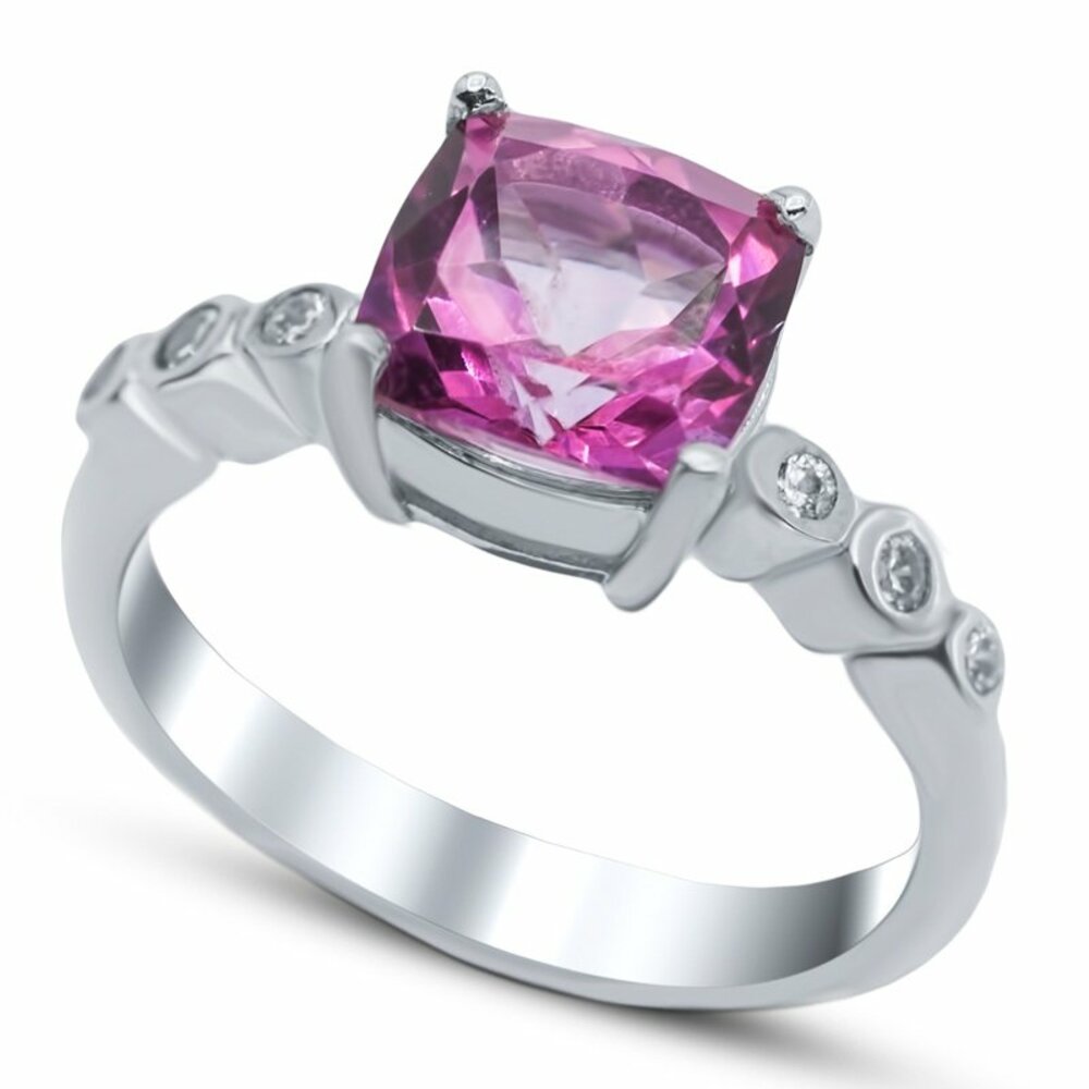 Серебряное кольцо 925 пробы; вставки 1 Топаз "Pink"; 6 Куб. Цирконий бесцв.;