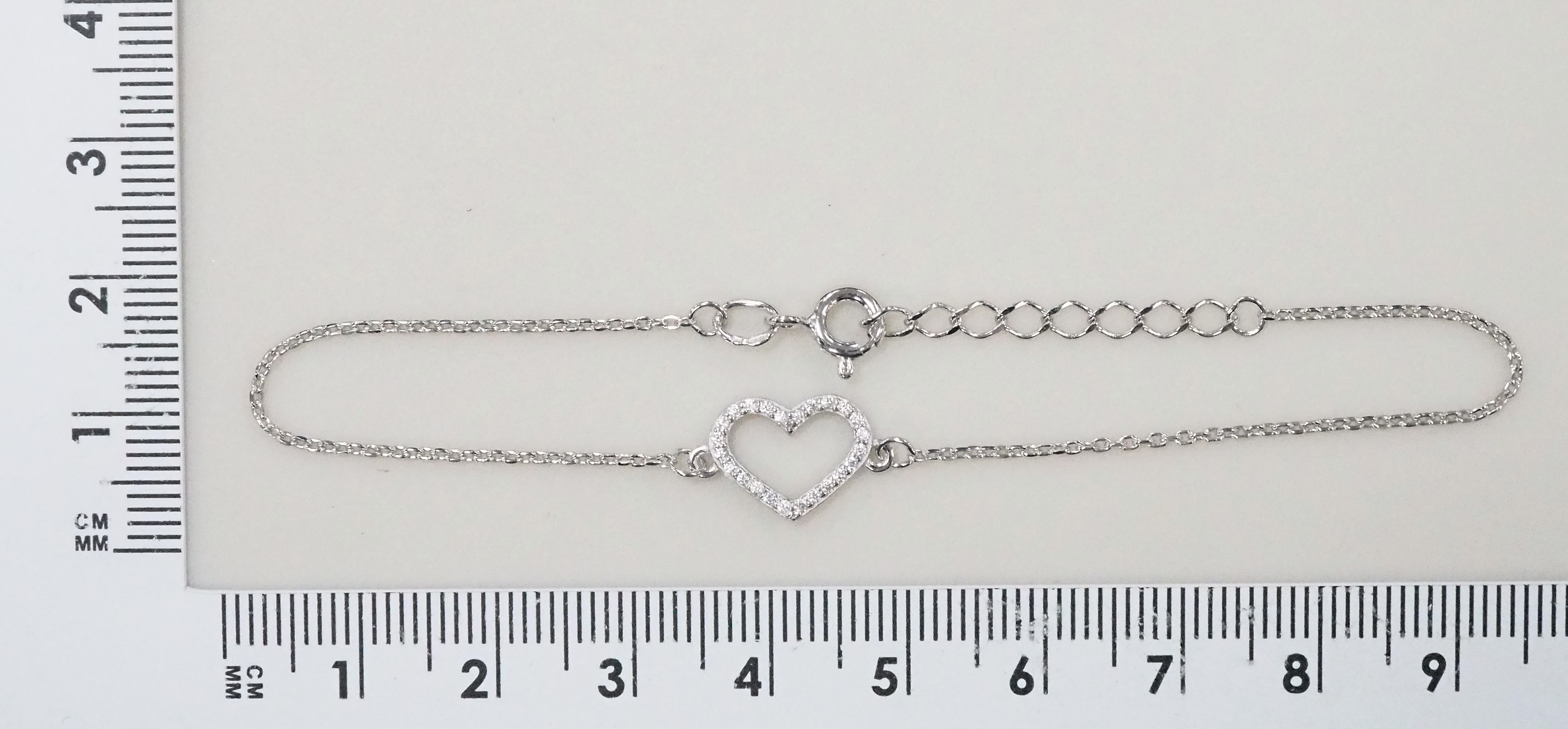 Серебряный браслет 925 пробы; плетение Якорное; вставки 24 Фианит бесцв.;