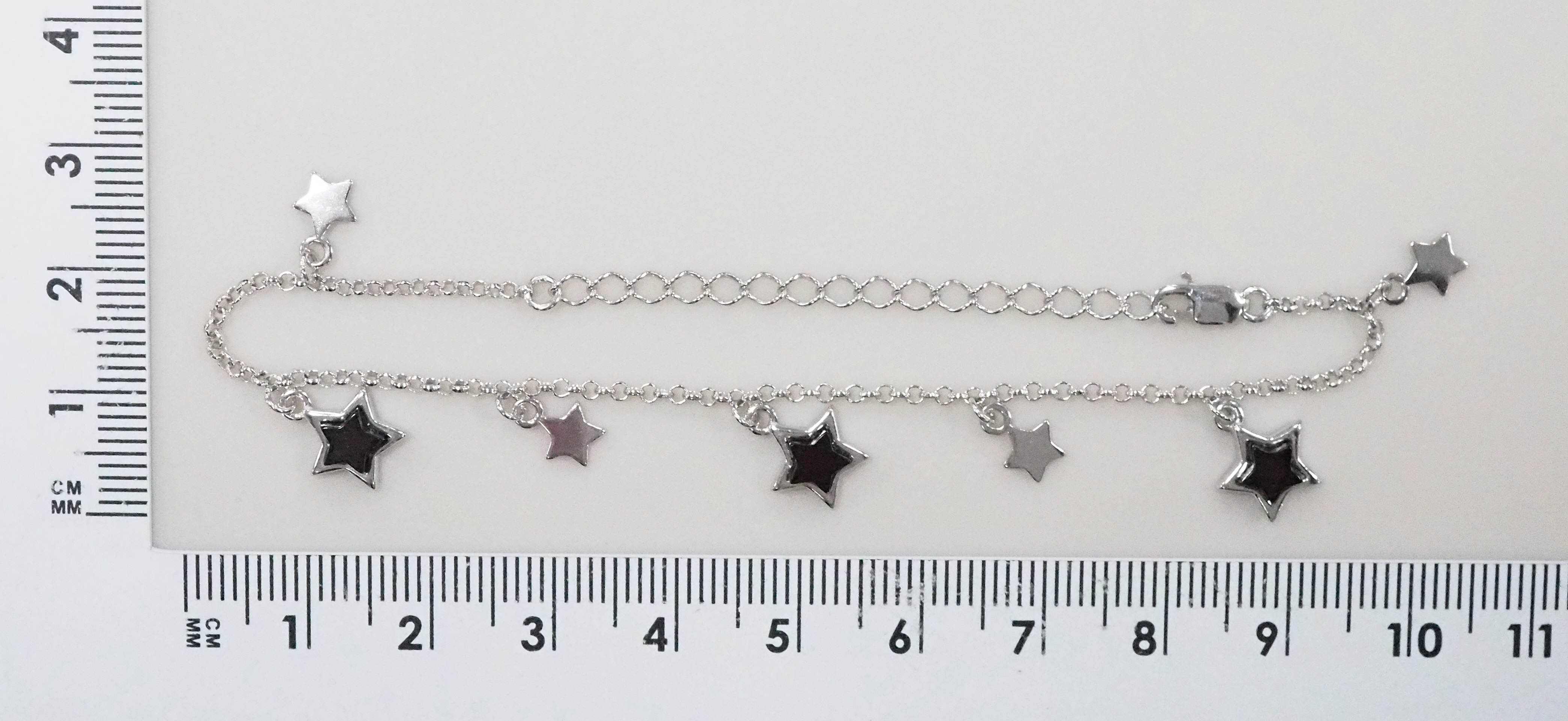 Серебряный браслет 925 пробы; плетение Ролло; вставки 3 Янтарь;