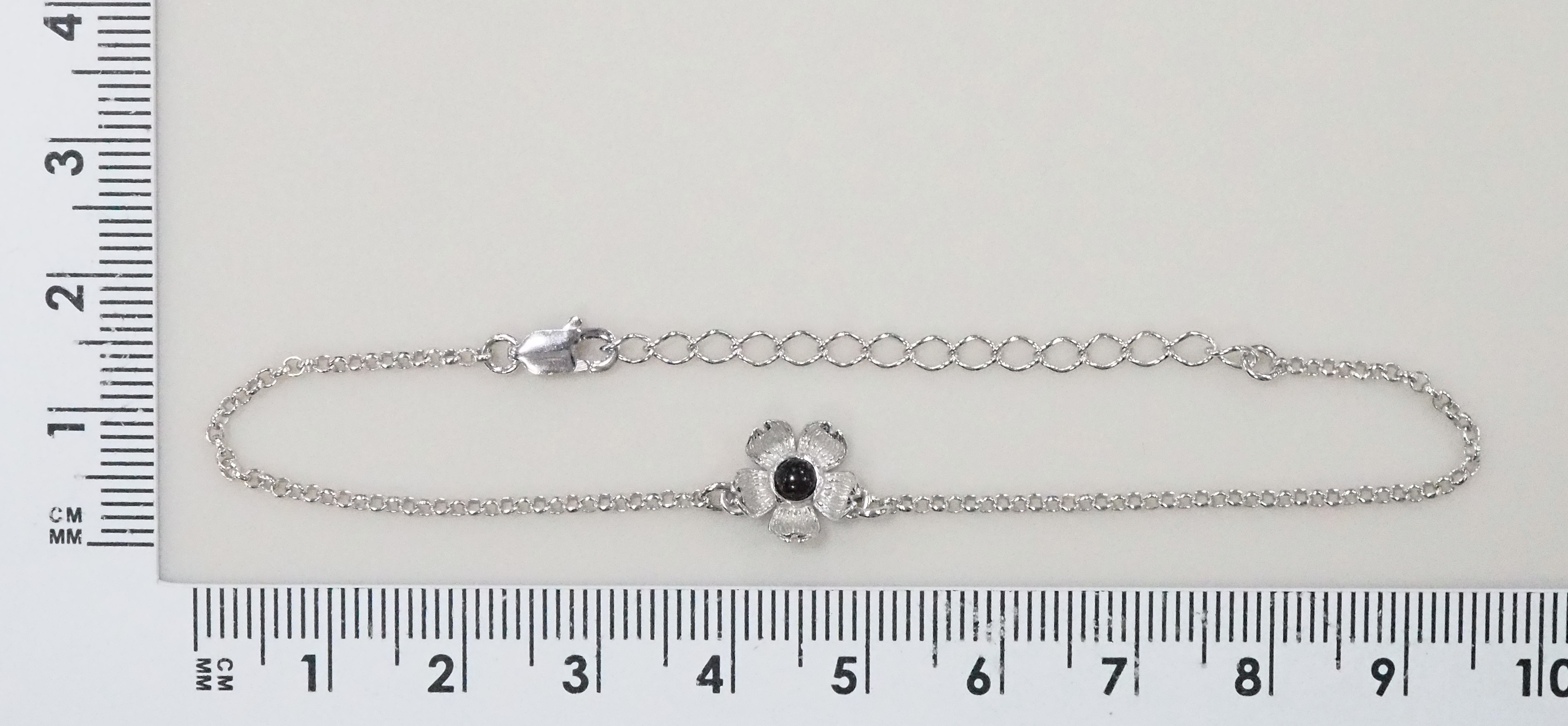 Серебряный браслет 925 пробы; плетение Ролло; вставки 1 Янтарь;