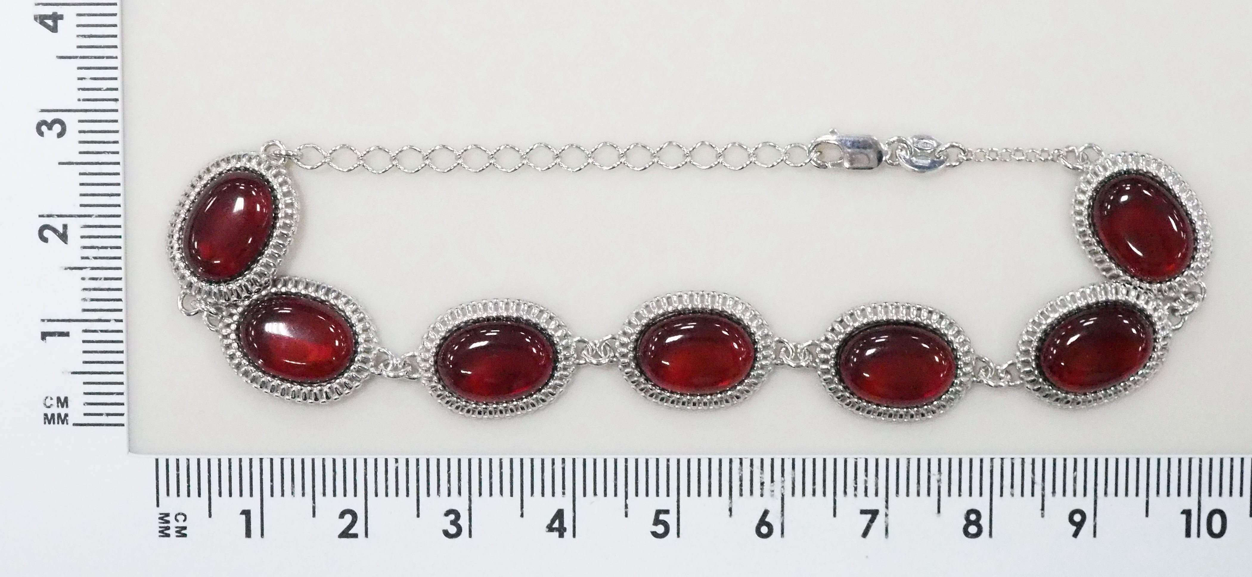 Серебряный браслет 925 пробы; вставки 7 Янтарь;