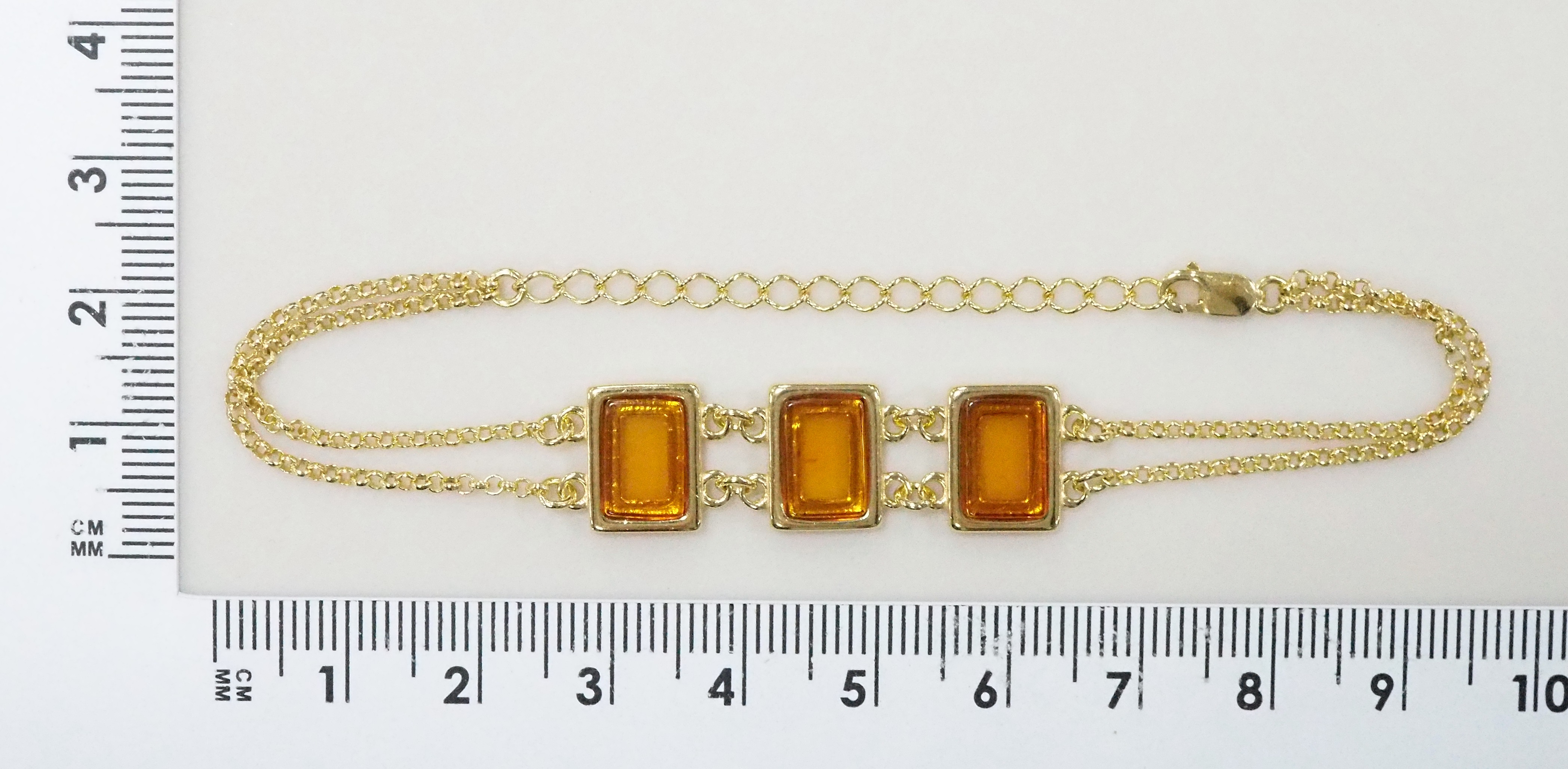 Серебряный браслет 925 пробы; плетение Ролло; вставки 3 Янтарь;