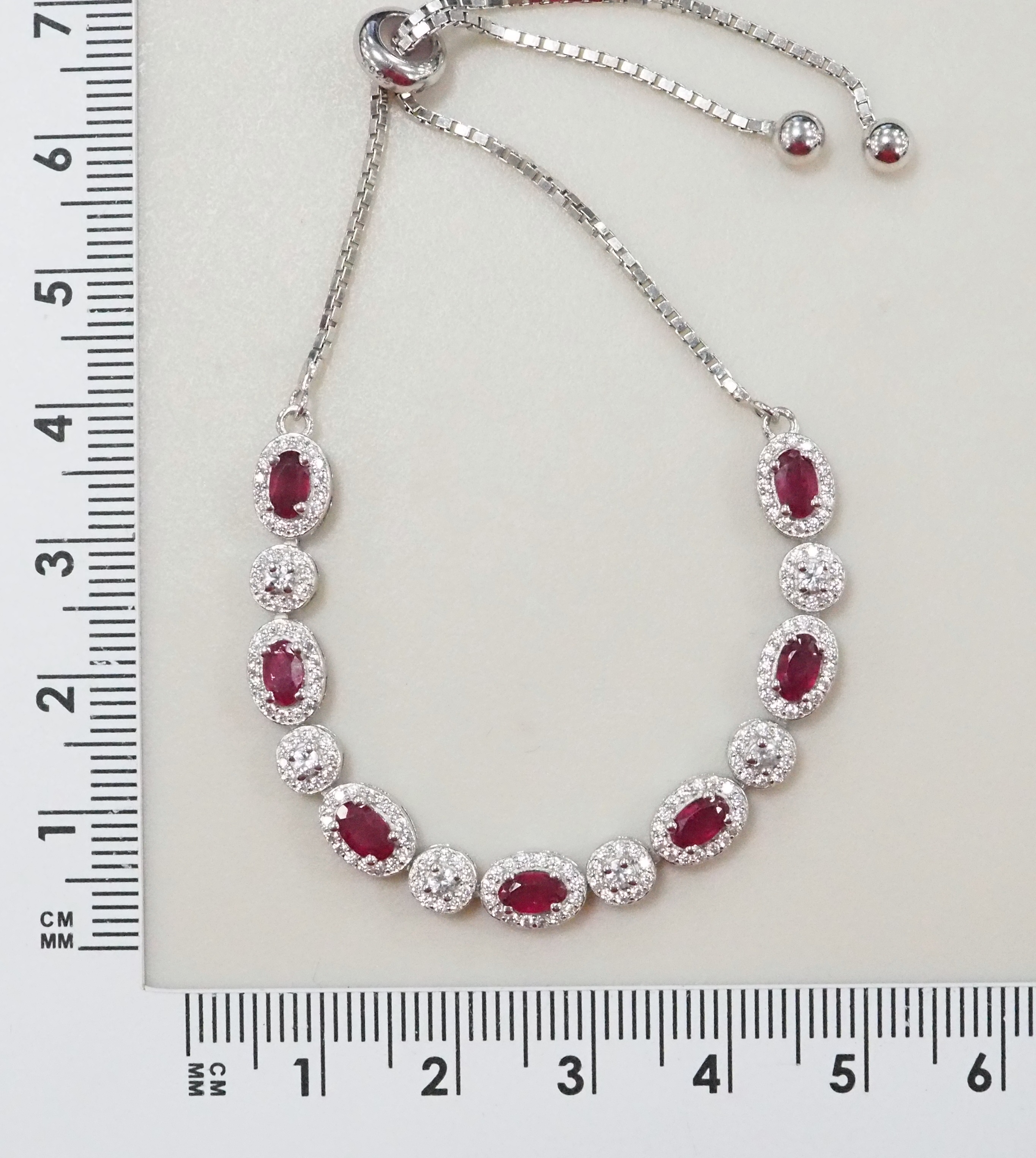 Серебряный браслет 925 пробы; вставки 7 Рубин 2,17ct F/2; Россыпь Куб.Цирконий бесцв.1,71 ct;
