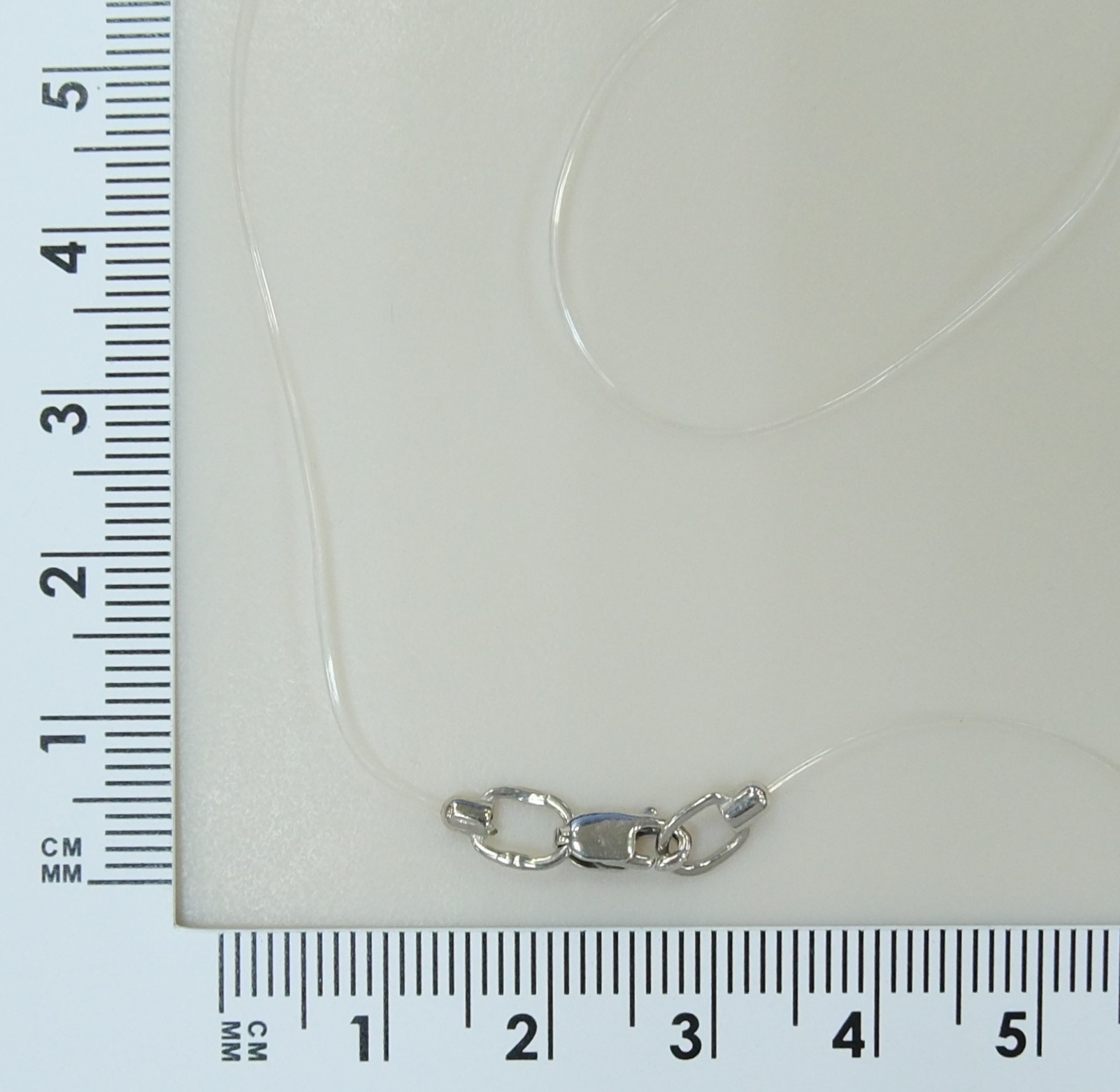 Серебряное колье 925 пробы; вставки Леска силик.;