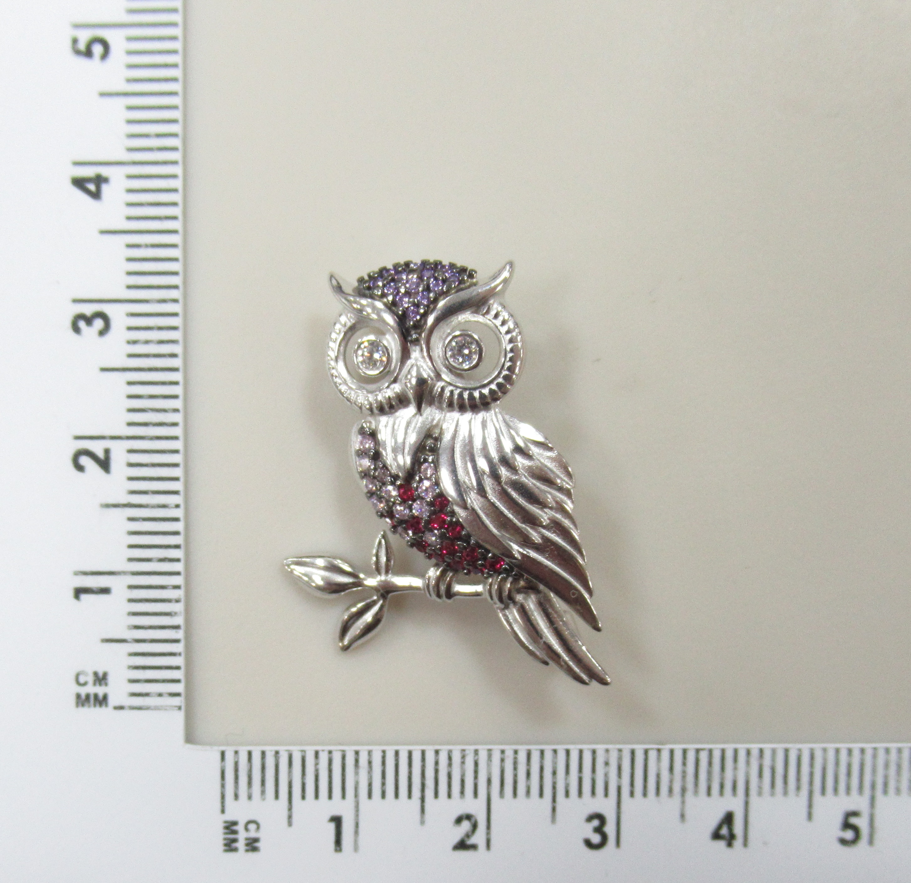 Серебряная брошь с корундами "Сова"