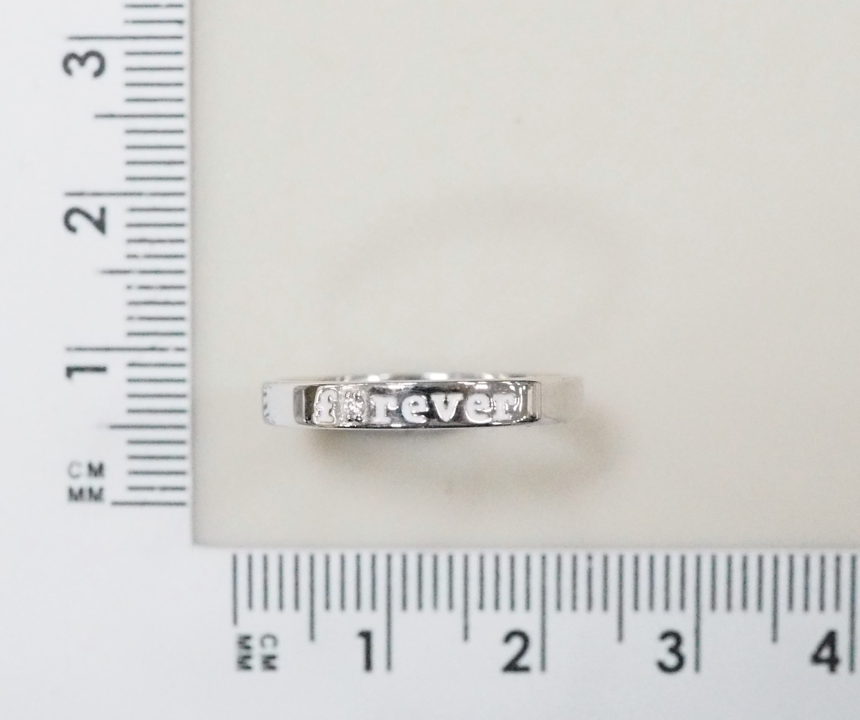 Серебряное кольцо 925 пробы; вставки 1 Фианит бесцв.; Эмаль белая;