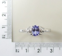 Серебряное кольцо 925 пробы; вставки 1 Танзанит 0,56ct; 2 Циркон бесцв. 0,04ct ;