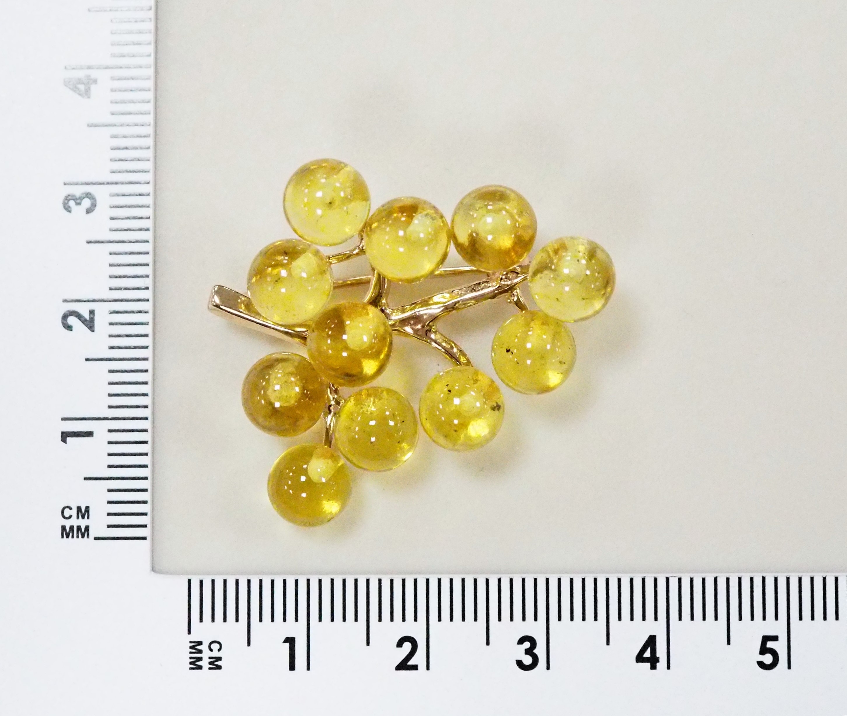 Серебряная брошь 925 пробы; вставки 11 Янтарь;
