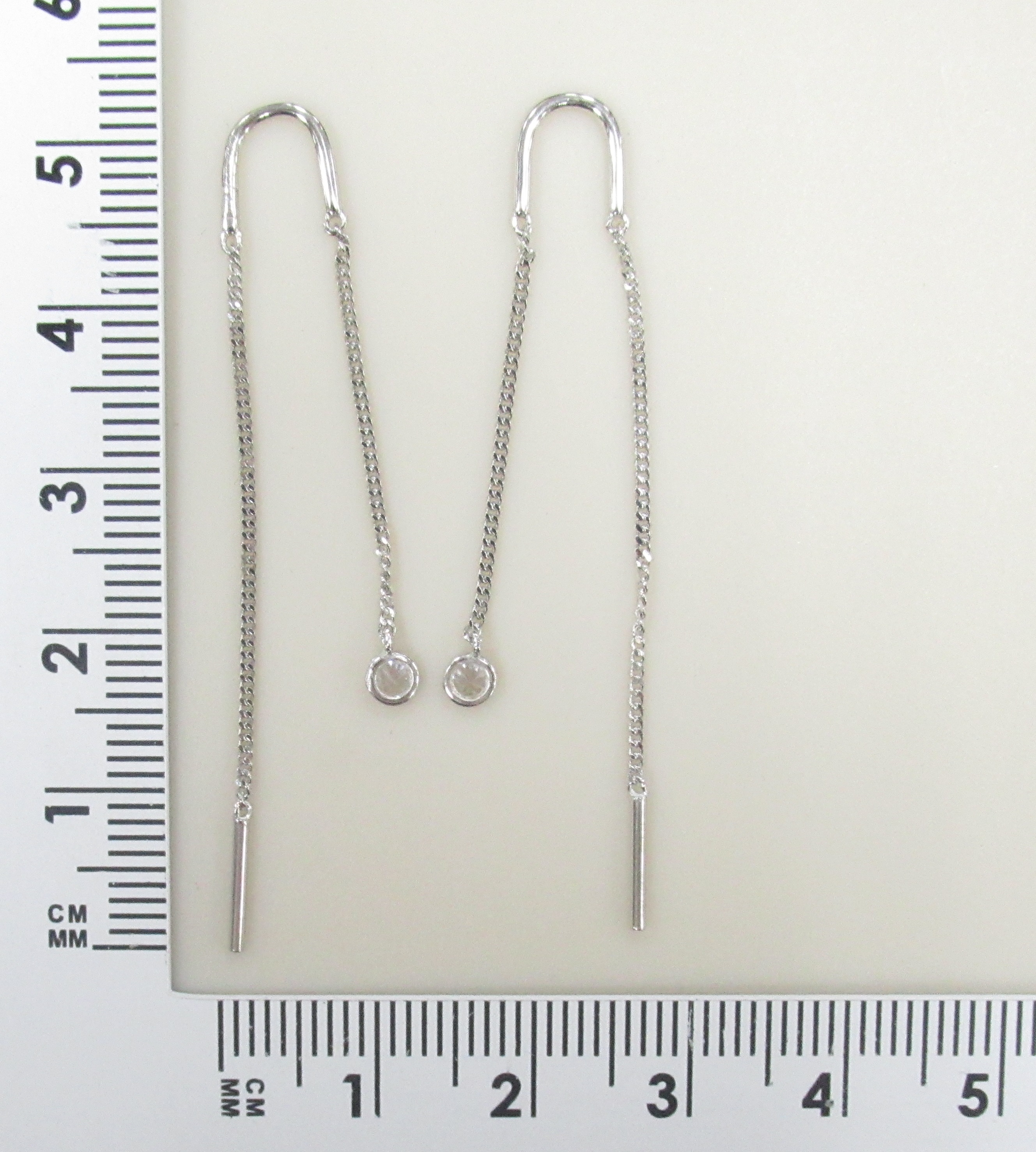 Серебряные серьги-протяжки с фианитами