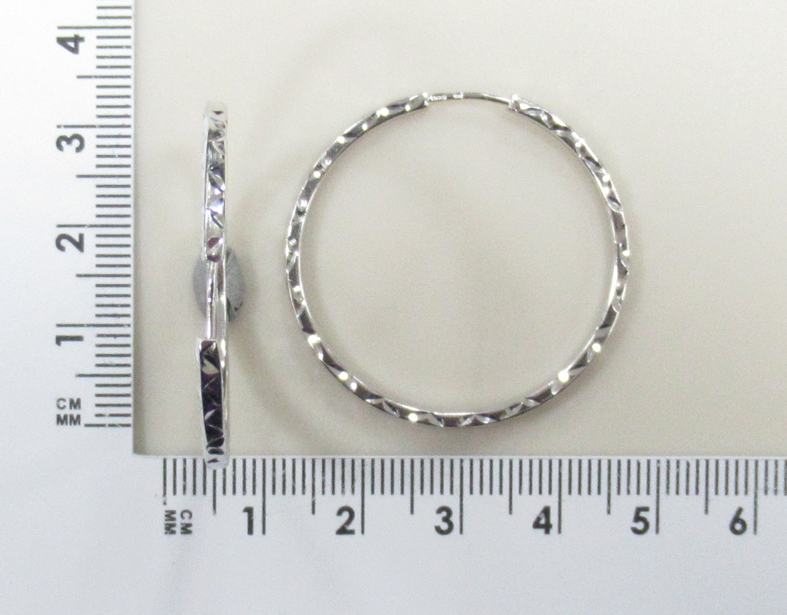 Серебряные серьги-конго 925 пробы; с алмазной обработкой;