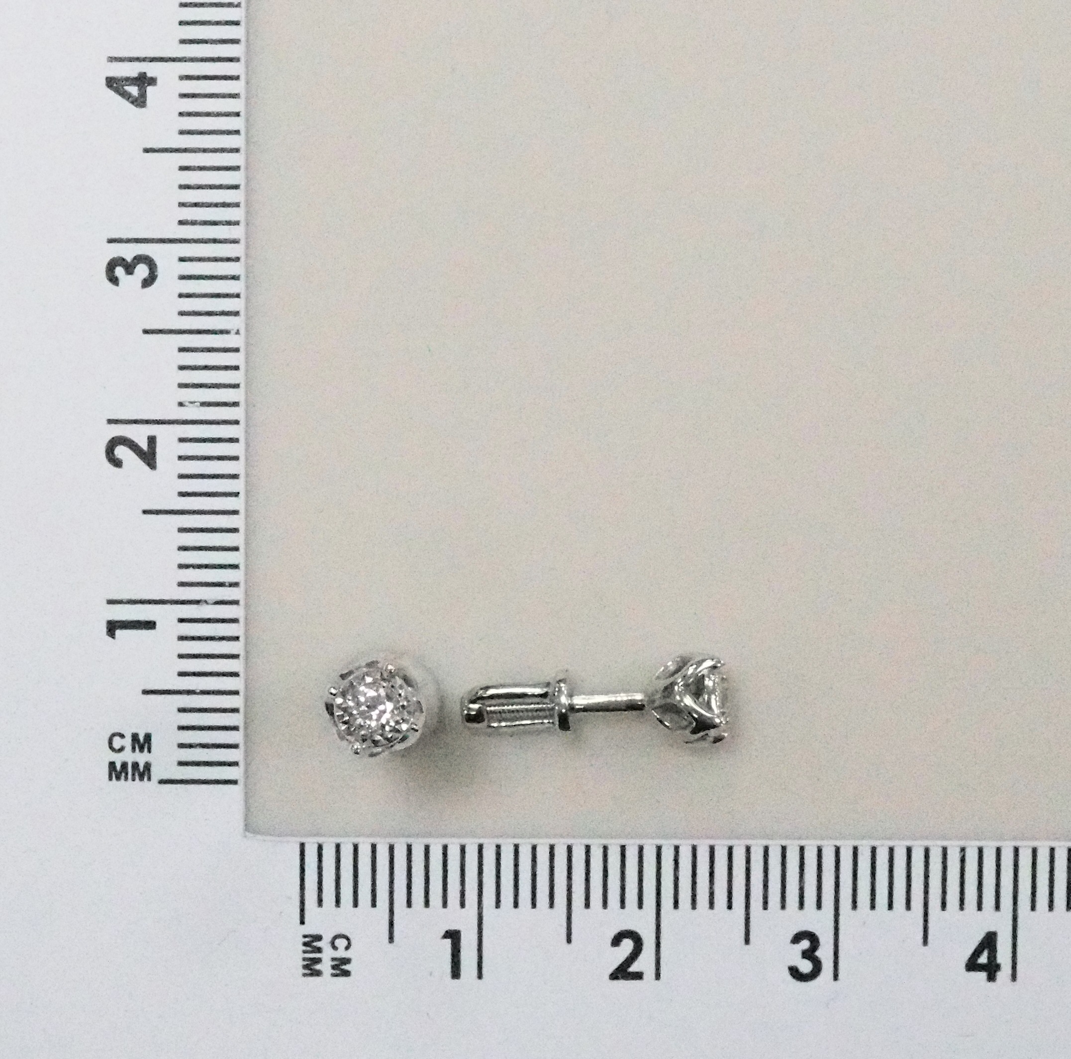 Золотые серьги-пусеты 585 пробы; белое золото; родий; вставки 2 Бр.Кр-57 0,140 3/6А