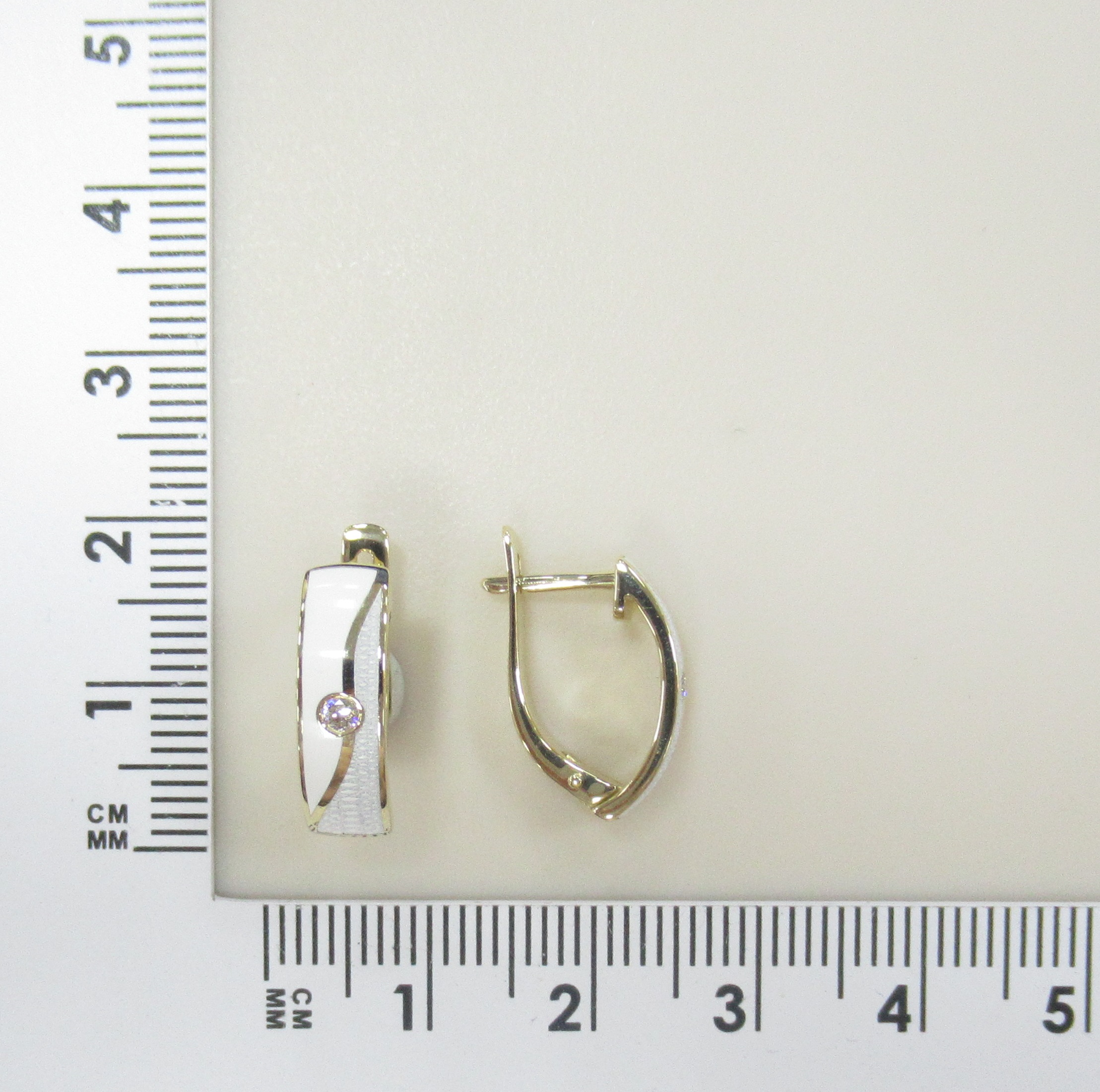 Золотые серьги 585 пробы; желтое золото; вставки 2 Бр.Кр-57 0,06 3/5А; Керамика цв.;